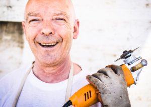 Worker holding a tool